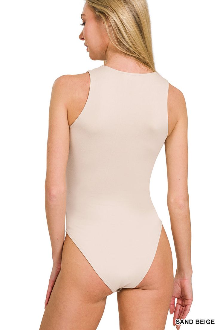 Removable bra pads help you layer with ease in this fitted tank bodysuit made from soft and stretchy fabric. Features: Removable bra pad Material: 90% polyester, 10% spandex Stretch: Moderate stretch Care: Machine wash cold. Tumble dry low. Made in Vietnam Style #MB-9087 Product Measurements S: 13.5 (Bust), 27.0 (Length) M: 14.0 (Bust), 27.5 (Length) L: 14.5 (Bust), 28.0 (Length) Farm Clothes, Kids Activewear, Tank Bodysuit, Padded Bras, Shoes Heels Boots, Boat Neck, Stretchy Fabric, Heeled Mules, Loafer Flats