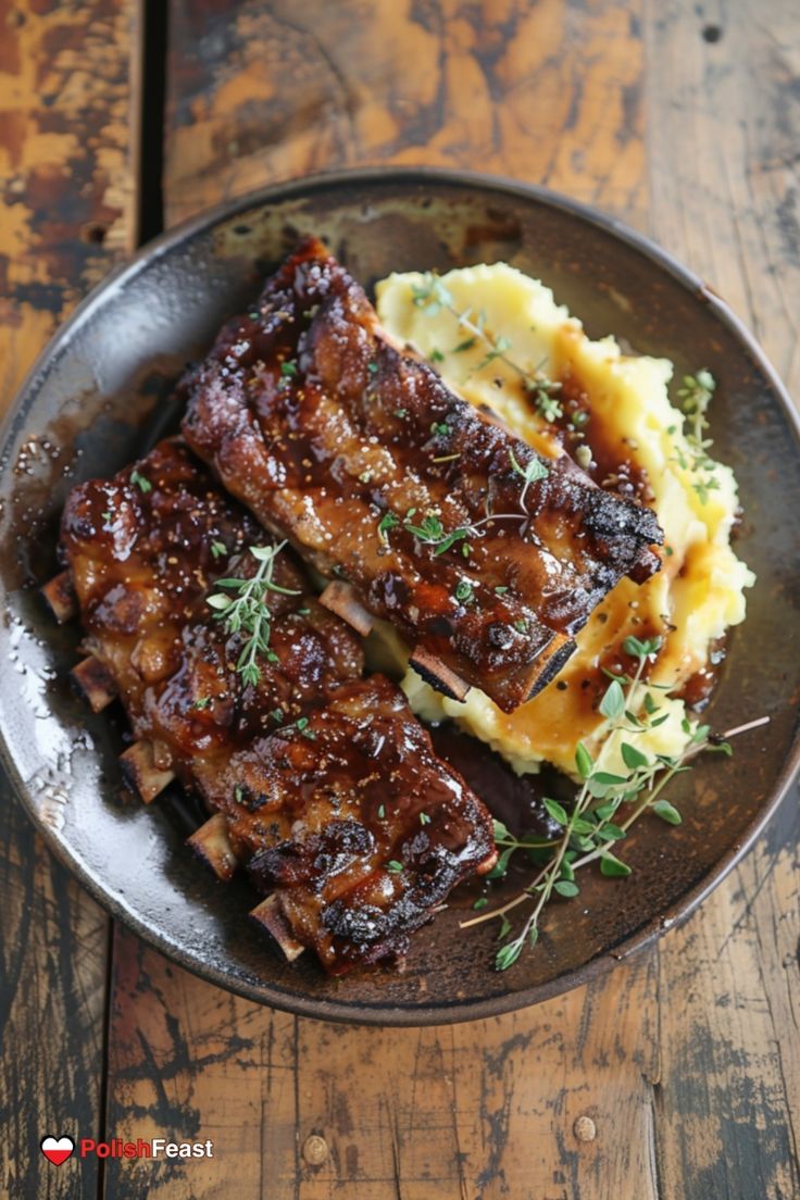 some meat and mashed potatoes on a plate