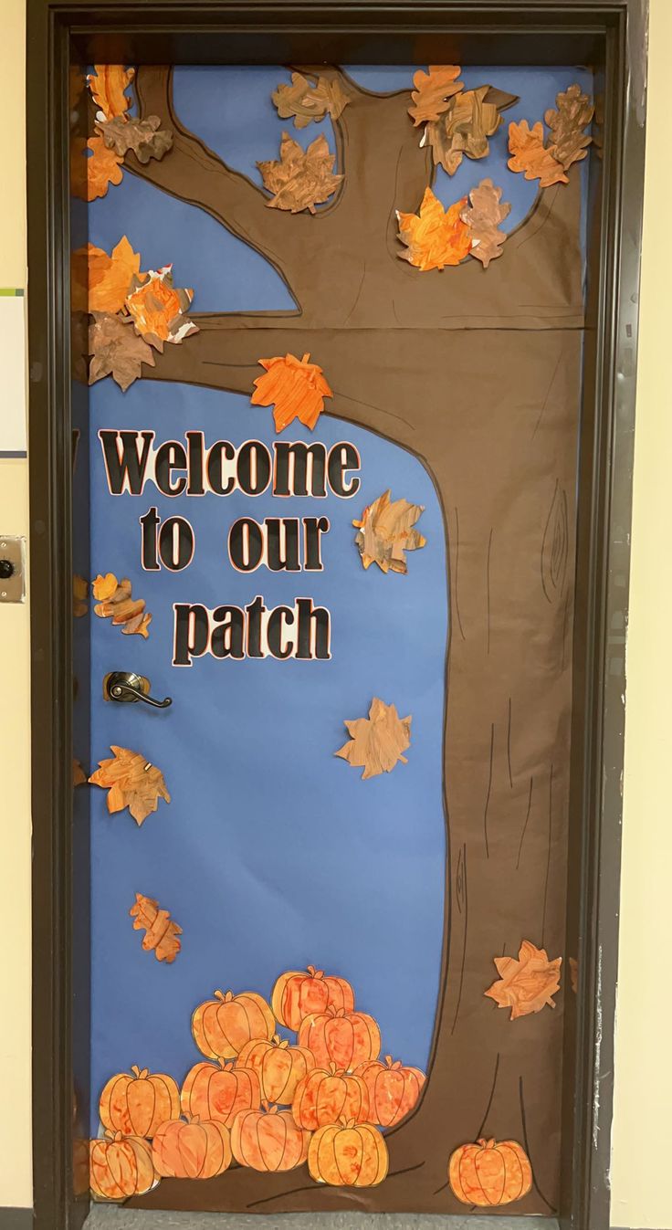 a door decorated with fall leaves and the words welcome to our patch