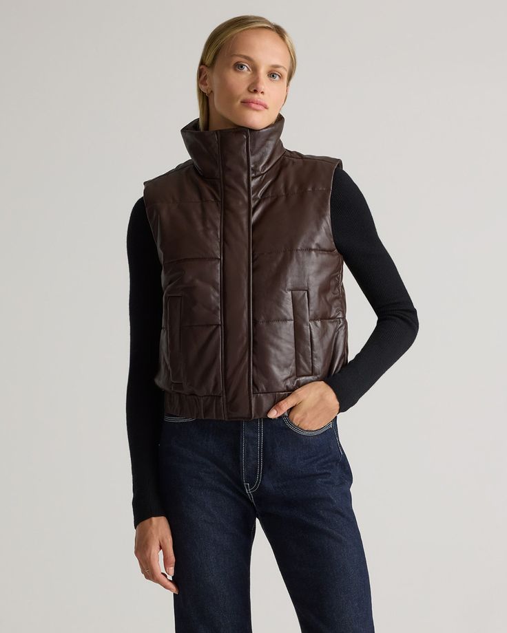 You've never seen a hybrid like this before. Our 100% Leather Puffer Vest combines the buttery soft texture of top grain sheep leather with the coziness of a puffer jacket. Perfect for transitioning through the seasons in chic, understated style. Layer it over a fitted sweater or long-sleeve tee for a refined, elegant look. Leather Puffer Vest, Leather Puffer, Womens Puffer Vest, Understated Style, Quarter Zip Sweater, Outerwear Vest, Sheep Leather, The Seasons, Fitted Sweater