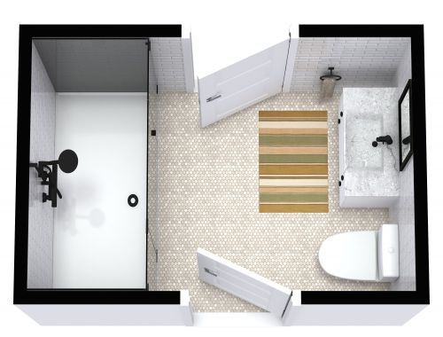 an overhead view of a bathroom with toilet, sink and bathtub in the corner