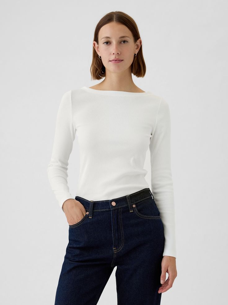 Soft cotton-modal blend, ribbed-knit cropped T-shirt.  Boatneck.  Long sleeves.  Certain styles have allover prints.  This product was made in a factory that runs the Gap Inc.  P. A. C. E.  Personal Advancement & Career Enhancement) program.  P. A. C. E.  is our educational program that helps the women who make our clothes build the skills, knowledge, confidence & resilience needed to advance in work & life.  Learn more here Fit: Stretch-to-Fit.  Slim & stretchy that forms to your shape.  Hits a Gap Tops For Everyday Fall Wear, Gap Everyday Tops For Fall, Everyday Gap Tops For Fall, Gap Everyday Fall Tops, Gap Fitted Tops For Fall, Trendy Gap Tops For Spring, Trendy Everyday Gap Tops, Gap Cropped Tops For Spring, Trendy Relaxed Fit Gap Tops