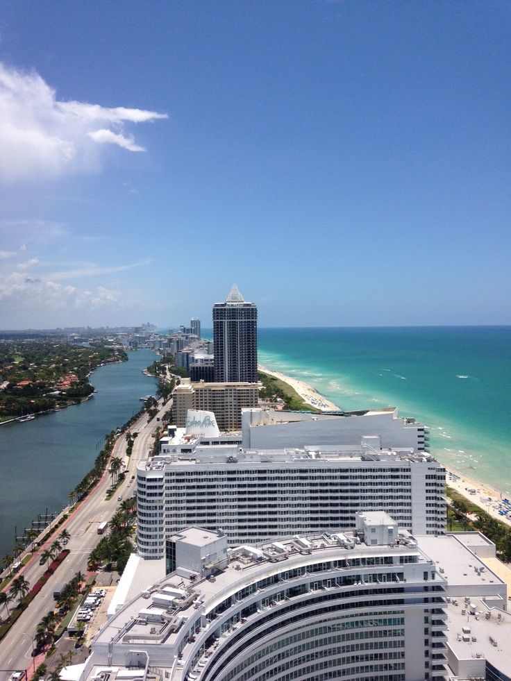 an aerial view of the beach and ocean from a high rise building in miami, florida