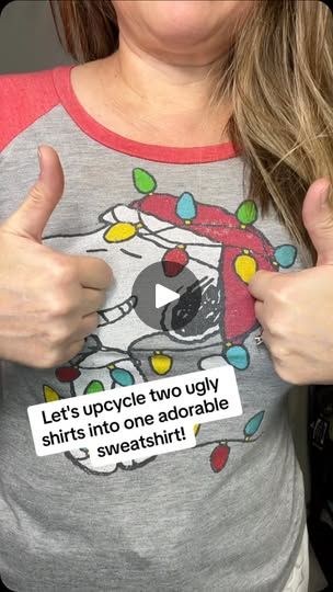 a woman wearing a hello kitty t - shirt giving the thumbs up with her hand