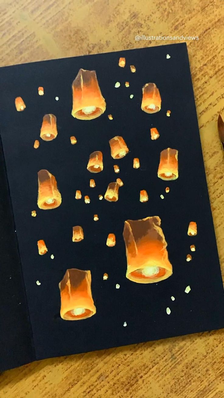 an open notebook with paper cut out to look like jellys