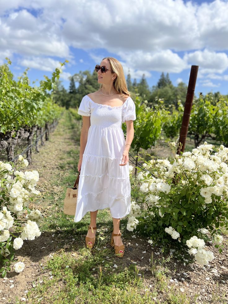 We are soaking up the warm summer days, wearing crisp white dresses like The Sarah as we make the most of what’s left of the season. Comfortable smocking and breathable fabrics make late summer dressing a breeze. 🤍 Daywear Maxi Dress With Ruched Bodice And Empire Waist, Empire Waist Maxi Dress With Fitted Bodice For Daywear, Chic Midi Dress With Ruched Bodice And Empire Waist, Chic Empire Waist Midi Dress With Ruched Bodice, Casual Empire Waist Dress For Garden Party, White Maxi Dress With Ruched Bodice And Empire Waist, Casual Empire Waist Midi Dress For Garden Party, Casual Midi Dress With Ruched Bodice And Empire Waist, White Midi Dress With Ruffles And Empire Waist