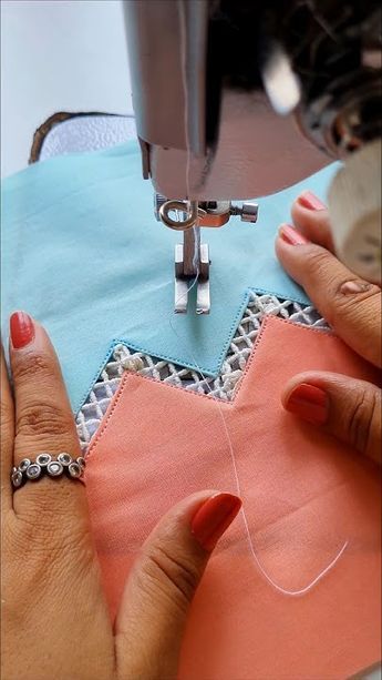 a woman is using a sewing machine to sew something