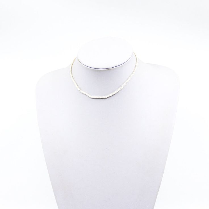 Necklace made up of petite pearls. Can be worn in two ways: as a choker, and as a necklace. Choose your style: plain, 1 charm or letter, or 2 charms (letter or charm). 13-15 inches in length. Minimalist Pearl Charm Choker Necklace, Minimalist Pearl Choker With Pearl Pendant, Minimalist Pearl Charm Choker, Minimalist Everyday Pearl Choker Necklace, White Pearl Choker With Delicate Chain, Minimalist Single Strand Choker, White Pearl Choker Necklace For Everyday, Everyday White Pearl Choker Necklace, Pearl Choker Necklace With Tiny Beads