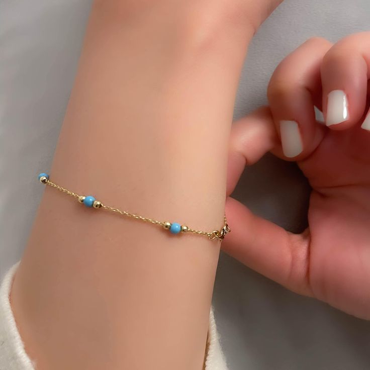 "◖ P R O P E R T I E S ◗ 14k Gold & Turquoise Beaded Dainty Bracelet, Aqua Blue Layering Bracelet, December Birthstone, Fine Jewelry, Graduation Gift * Material: 14k Yellow Gold, 14k Rose Gold, 14k White Gold * Chain Width: 0,04\" // 1mm (±10%) * Size: 6\" - 8\" // 15,2cm - 20,3cm (Please contact me for different sizes) * Adjustable: 0,5\" extension will be added to selected length. Note: Beads count may be differ due to selected length. ◖ D I O N J E W E L ◗ ‣ 14K REAL GOLD ‣ EXPRESS DELIVERY I Gold Heart Bracelet, White Gold Chain, Jewellery Marketing, Dainty Bracelet, Dainty Bracelets, Layered Bracelets, December Birthstone, Heart Bracelet, Turquoise Beads