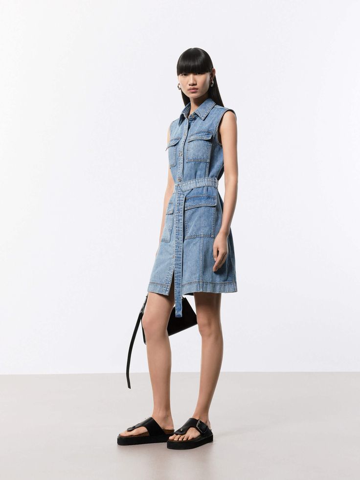 MO&Co. Women's Belt Sleeveless Denim Dress Made with pure cotton denim, this dress hugs your curves and accentuates your waist with its adjustable belt. Multiple pockets in the front add style and functionality, making this the perfect dress for a casual day out or a night on the town. Features : - Straight cut mini denim dress- Front multi pocket design- Button closure, belt including Code: MBD2DRST61The back length of size S is 82.3cmMATERIALS & CARE Material: 100% CottonPlease remove accessor Sleeveless Denim Dress, Women's Belt, Adjustable Belt, Celebrity Dresses, Straight Cut, Pocket Design, Belts For Women, Perfect Dress, Denim Dress