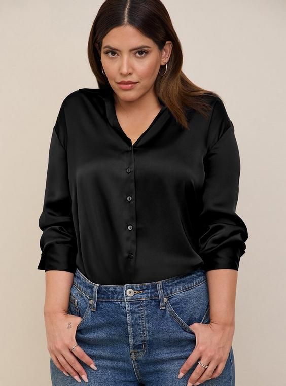 FIT Model is 5'9” wearing size 0. Measures 30” from shoulder (size 2). MATERIALS + CARE Satin woven fabric. 100% polyester. Machine wash cold. Dry low. . Imported. DETAILS Collared neckline. . Button front. Long sleeves. The best plus size women's satin button up long sleeve shirt tops in deep black made of satin. Torrid is your destination for cozy fall and winter clothes to keep you warm and comfortable. Womens Button Up Shirt Outfit, Black Satin Shirt Outfit, Satin Shirt Outfit, Silk Shirt Outfit, Black Satin Shirt, Dressy Clothes, Madison Style, Black Silk Shirt, Satin Button Up