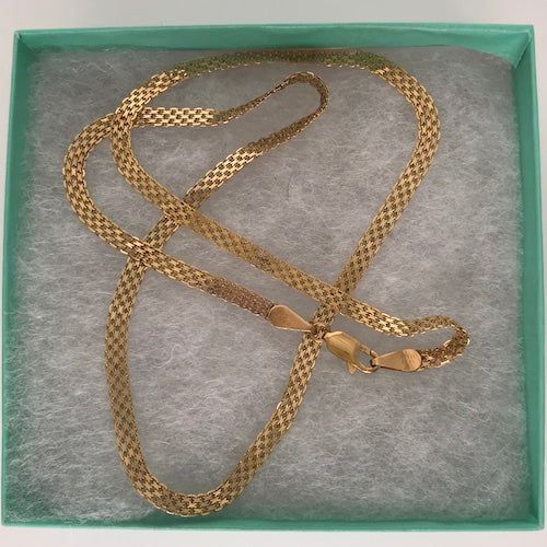 The tightly woven pattern of Bismark links is an utterly classic look that truly transcends time and trend. From Italy, this stunning 1/8" wide necklace shines in polished 14kt yellow gold. Dress it up or pare it down for countless looks that all exude opulent class. This bismark chain necklace is formed by soldering parallel links. Its distinctly modern mesh is reminiscent of armor. Length: 19" Weight: 3.8 dwtWidth: 3.5mmMetal: 14k Yellow GoldType: Flat Chain MeshClosure: Lobster ClaspHallmarke Yellow Gold Dress, Mens Stainless Steel Rings, Gold Chain Design, Gold Flats, Woven Pattern, Silver Line, Link Chain Necklace, Chain Design, Garnet Rings