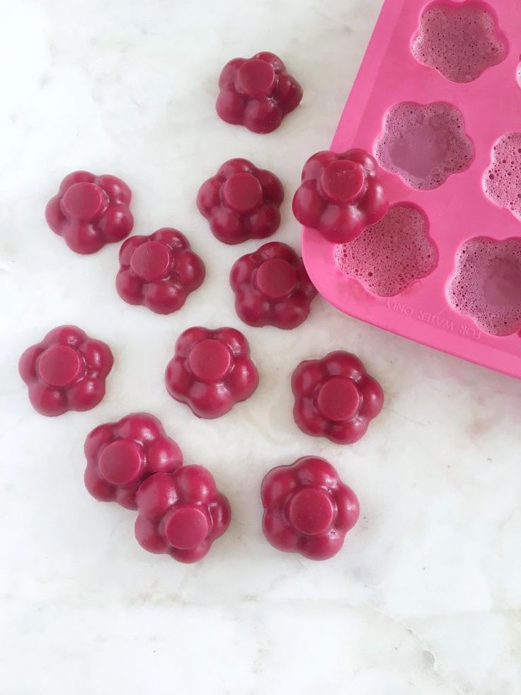 red beet gummies in a pink tray with text overlay that reads, rose bet gummies pale + sugar free