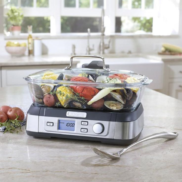 a blender with food in it sitting on a kitchen counter