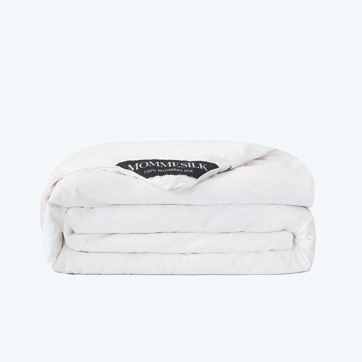 a white blanket folded on top of each other