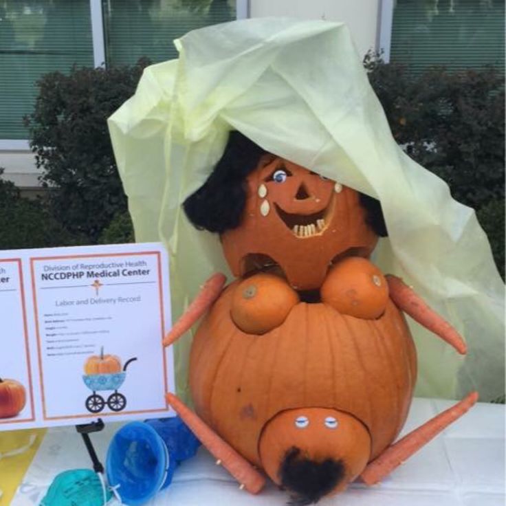 a large pumpkin sitting on top of a table