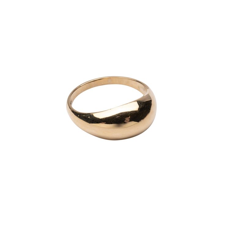 a gold ring on a white background with no one in the photo to describe it