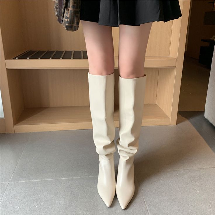 Candela Knee High Boots Upper Material: Genuine Cow Leather + MicrofiberLining Material: SyntheticShaft Material: PUInsole Material: PigskinOutsole Material: TPRHeel height: 7cm Velvet Option: Lining Material: Short Plush We pay your attention on the fact that different computer screens can display different colors even though this is one and the same color. Therefore color of the received good can be a little bit different than the good on the photo. Fitted Cream Boots With Pointed Toe, Cream Pointed Toe Fitted Boots, Fitted Cream Pointed Toe Boots, Cream Fitted Knee-high Boots With Round Toe, Fitted Cream Knee-high Boots With Round Toe, Cream Colored Fitted Heeled Boots With Pointed Toe, Fitted Cream Knee-high Heeled Boots, Fitted Cream Heeled Boots For Winter, Cream Knee-high Winter Boots