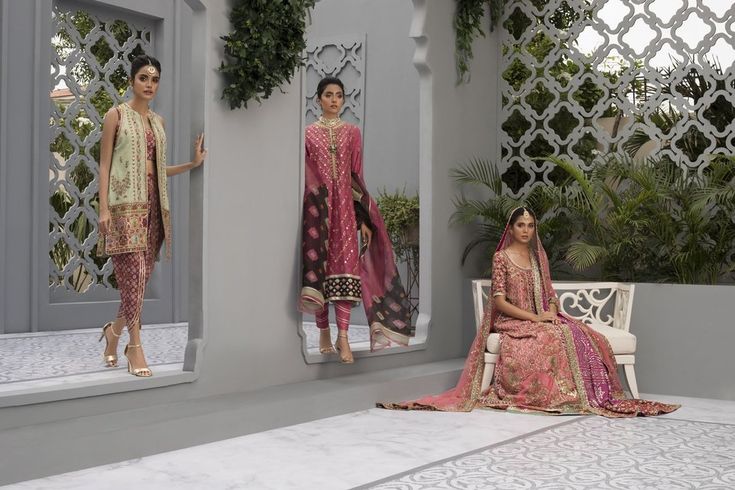 Varying hues of pinks and fuschia, counterbalanced with celadon and vermillion, this cotton net peshwas is crafted with meticulous attention to detail. The handcrafted techniques in traditional zardoze, sequins and gota work pay homage to elegance and magnificence. The net dupatta mirrors the hints of colour through it Pink Chanderi Kurta With Mirror Work, Traditional Pink Sharara With Chikankari Embroidery, Pink Dola Silk Kurta With Cutdana, Traditional Pink Salwar Kameez With Chikankari Embroidery, Pink Dola Silk Kurta With Chikankari Embroidery, Pink Salwar Kameez With Chikankari Embroidery, Pink Chikankari Embroidery Salwar Kameez In Chinon, Pink Chikankari Embroidery Kurta In Dola Silk, Pink Chikankari Embroidered Kurta In Dola Silk