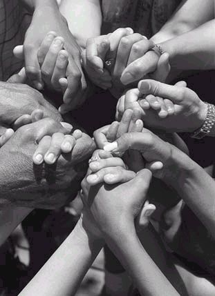 a group of people holding their hands together in a circle with the caption's above them