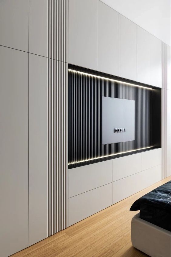 a modern bedroom with white and black decor