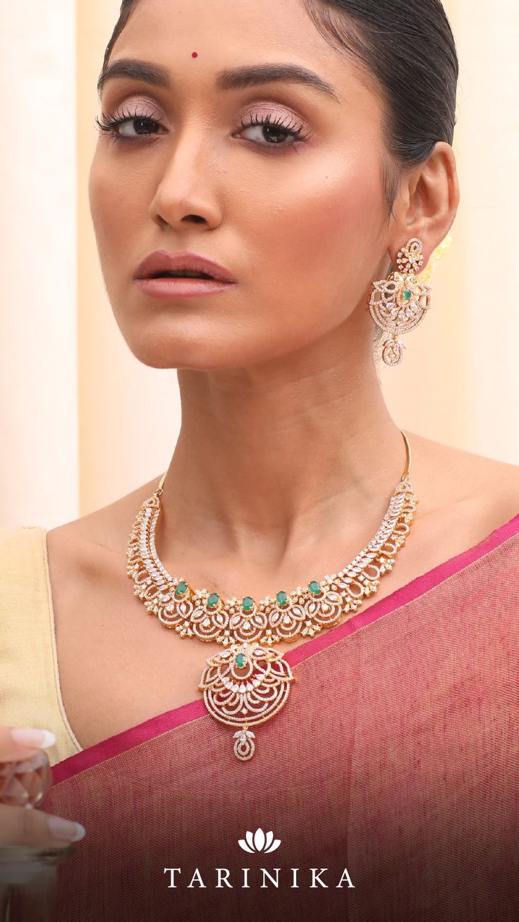 Introducing the Mahasri Nakshatra CZ Necklace Set - an embodiment of regal elegance. Sparkling CZ stones adorn this exquisite set, exuding brilliance that captivates all. Elegant Dual-tone Necklace For Diwali, Diamond Chandbali Necklaces For Diwali, Chandbali Diamond Necklace For Diwali, Hand Set American Diamond Chandbali Necklaces, Elegant Kundan Dual-tone Bridal Necklace, Elegant Dual-tone Kundan Bridal Necklace, Festive Chandbali Necklace With American Diamonds, Elegant Dual-tone Chandbali Bridal Necklace, Festive Chandbali American Diamond Necklace