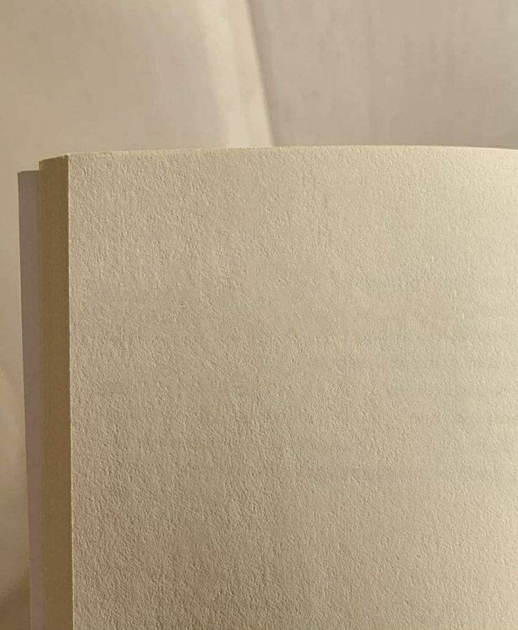 an open book sitting on top of a table