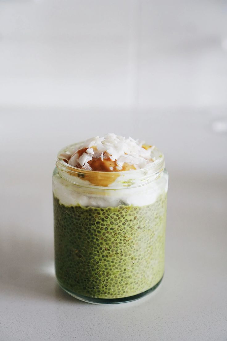 a jar filled with food sitting on top of a table