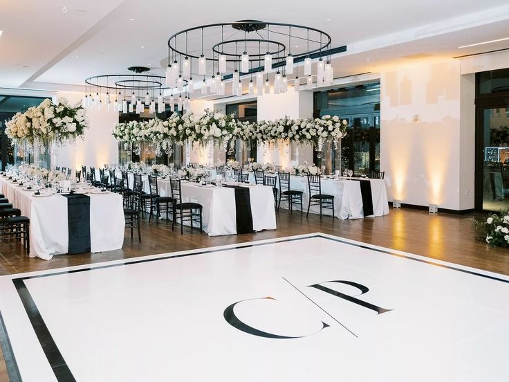 a dance floor with tables and chairs set up for a wedding reception at the four seasons hotel