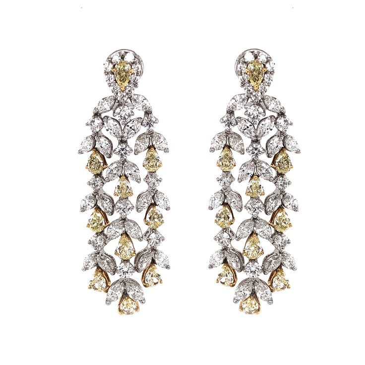 Handcrafted 18 karat gold chandelier earrings with pear cut fancy yellow diamonds 6.90 ct total. It is accented with round and marquise white diamonds 10.58 ct total. Diamonds are all natural in G-H Color Clarity VS. French / Omega clips. A truly breath taking piece inspired by Hollywood glamour and Art Deco style. Width: 1.8 cm Height: 5.8 cm Weight: 44.4 g Chandelier Contemporary, Beautiful Diamond Earrings, Yellow Gold Diamond Earrings, Diamond Chandelier, Gold Chandelier Earrings, Rings Luxury, Platinum Earrings, Diamond Bling, Fancy Yellow Diamond