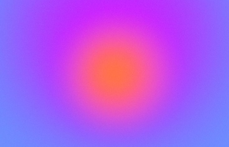 a blurry image of blue, pink and orange