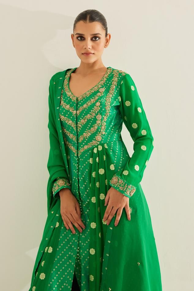 Designer Green Raw Silk Anarkali Set, Green Raw Silk Anarkali Set For Designer Wear, Green Cutdana Raw Silk Anarkali Set, Anarkali Green Choli For Navratri, Green Chanderi Choli For Transitional Season, Green Semi-stitched Raw Silk Anarkali Set, Green Anarkali Salwar Kameez In Raw Silk, Green Raw Silk Anarkali Set For Navratri, Green Raw Silk Anarkali Churidar