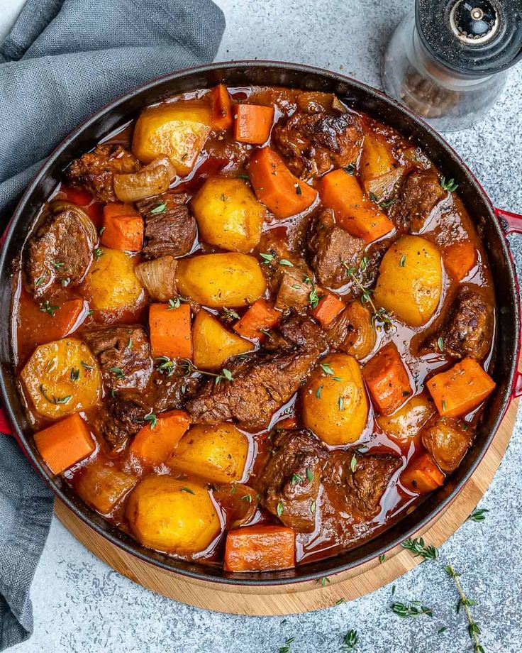 beef stew with carrots and potatoes in a pot