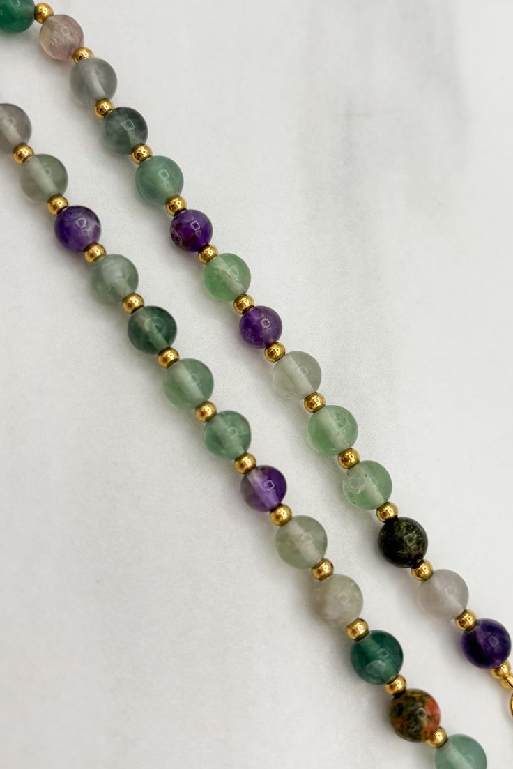 Introducing our beautiful Natural Stone Bead & Gold Chain Necklace! Add a touch of elegance to any outfit with the delicate gold chain and unique natural stone beads. Elevate your style and embrace the natural beauty of this one-of-a-kind necklace. Limited stock available, order now! Details: Natural Fluorite Gold Plated Stainless Steel Chain Length 45cm Gold Beaded Necklaces With Gemstone Beads For May Birthstone, Everyday Green Beaded Chain Necklace, Elegant Beaded Necklaces For Meditation, Gold Gemstone Beaded Necklace For May Birthstone, Dainty Green Necklace With Round Beads, Crystal Necklaces With Delicate Chain And Round Beads, Everyday Gold Beaded Necklace With Natural Stones, Everyday Green Beaded Necklaces, Gold Beaded Necklaces For May Birthstone