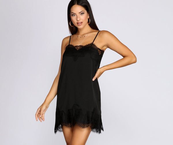 Have the sweetest evening in this slip dress! Perfect to wear alone or for layering. this slip dress features adjustable shoulder straps. a delicate lace trim. and a flowy fit. Garment is composed of an unlined smooth woven fabric with no stretch.Model is 5'9" with a 32" bust. 23" waist and 34.5" hips. She is wearing a size small. Flirty Sleeveless Slip Dress With Lace Trim, Feminine Mini Dress With Spaghetti Straps And Delicate Lace, Feminine Spaghetti Strap Mini Dress With Delicate Lace, Camisole Dress With Lace Trim For Night Out, Elegant Mini Dress With Lace Trim And Spaghetti Straps, Delicate Lace Slip Dress For Night Out, Flirty Camisole Dress With Lace Trim, Flirty Summer Slip Dress With Lace Trim, Flirty Slip Dress With Adjustable Straps For Date Night