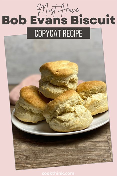 four biscuits stacked on top of each other on a plate with text overlay that reads, my favorite biscuit copycat recipe