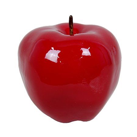 a red apple with two holes in the middle