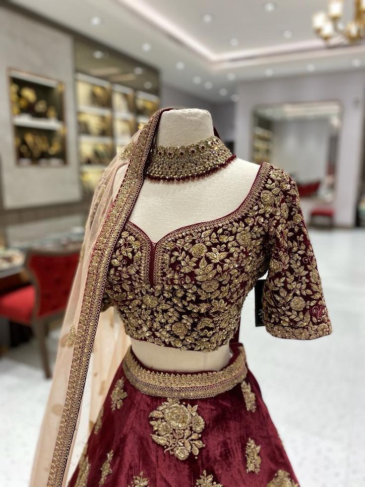 The BL-007 bridal lehenga is a stunning choice for that special day. Featuring intricate detailing and premium fabric, this beautiful lehenga is perfect for traditional ceremonies. Its intricate embroidery and grand silhouette make it an ideal fit for formal events, making a lasting impression. Fabric: Velvet WASH CARE INSTRUCTIONS - Please Dry clean only when it is applicable Ready to Ship! Wedding Lehenga With Resham Embroidery In Chinon, Embroidered Lehenga For Wedding Eid, Embroidered Lehenga For Wedding Eid Celebration, Embroidered Lehenga For Wedding On Eid, Embroidered Lehenga For Wedding And Eid, Embroidered Lehenga For Wedding During Eid, Unstitched Chinon Lehenga For Wedding, Semi-stitched Kundan Gown With Intricate Embroidery, Wedding Choli With Dabka Work For Festivals