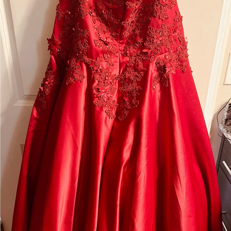 Ball Room Style Gown. Bought For A Wedding But Was Never Worn Because It Was Big Elegant Red Ball Gown With Sweep Train, Elegant Red Ball Gown With Sweetheart Neckline, Red Sleeveless Wedding Evening Dress, Red Ball Gown For Red Carpet, Red Ball Gown With Sweep Train For Prom, Red Dress For Debutante Ball And Prom Season, Red Ball Gown With Sweep Train For Wedding, Red Sweep Train Ball Gown For Wedding, Red Floor-length Gown For Debutante Ball