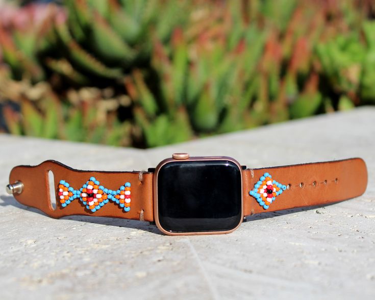 Following the huge success of our store on Etsy since its opening last year, we have decided to open our website in order to meet the demand for our handmade Apple Watch Bands. (Free returns, Free shipping, 30-day money-back-guarantee, 1 year warranty) Make your watch stand out with this western leather apple watch band. Navajo and Aztec inspired design. Very comfortable to wear daily. Perfect for casual or dressy attire. Unique handmade product requiring 11 hours of artisanal labor. Made by art Dressy Attire, Beaded Dog Collar, Leather Apple Watch Band, Watch Stand, Leather Ideas, Breaking In, Apple Watch Bands Leather, Apple Watch Models, 38mm Apple Watch Band