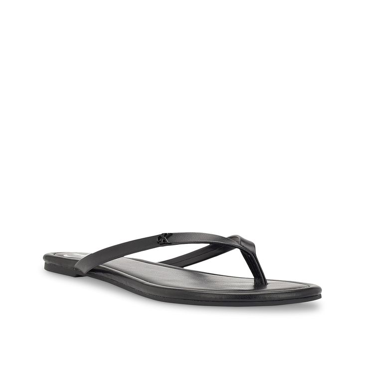 Calvin Klein-Crude Sandal Casual yet elegant, the Crude sandal from Calvin Klein is perfect for summer outings. Made of long-lasting synthetic upper, this flat features a flip-flop design that is highlighted with contrast logo details for added allure. Sleek Synthetic Flip Flops For Beach, Sleek Sandals With Cushioned Footbed For Beach, Sleek Synthetic Flip Flops For Summer, Sleek Synthetic Summer Flip Flops, Sleek Summer Beach Flip Flops, Sleek Single Toe Strap Flip Flops For Summer, Sleek Flip Flops With Single Toe Strap For Beach, Sleek Single Toe Strap Sandals For Beach, Sleek Open Toe Flip Flops For Beach