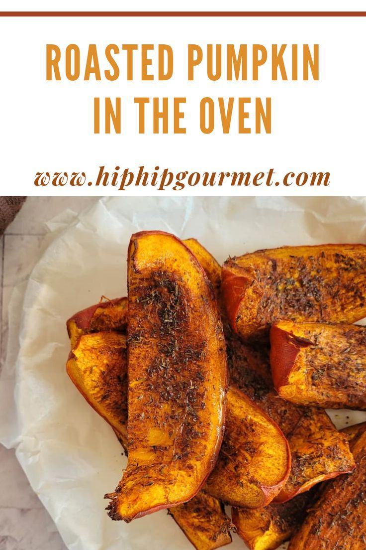 roasted seasoned pumpkin wedges on a parchment lined plate Roast Whole Pumpkin, Oven Roasted Pumpkin, Roasted Pumpkin Recipe, Roasted Pumpkin Recipes, How To Roast Pumpkin, Holiday Sides, Pumpkin Recipe, Best Oven, How To Roast