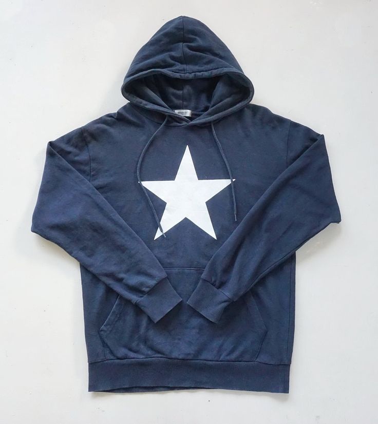 "Japanese brand BROWNY hoodie with big star printed and big pocket in front. Condition: Good used condition. 8/10 (lints at some parts) Weight: 460gm Size on Tag: M Measurements in inches (done with the item laying flat): Armpit to armpit: 20.5\" Length: 26\" Shoulder to shoulder: 20\" Sleeve length: 23.5\"  * Kindly check the measurement and do not rely on tag size. * Colours of pictures uploaded may slightly vary due to photographic lighting sources / monitor settings. * Item will be shipped w Fall Cotton Sweatshirt With Star Patch, Casual Oversized Hoodie With Star Print, Cheap Navy Hoodie Sweatshirt, Fall Cotton Sweatshirt With Star Print, Cotton Sweatshirt With Star Patch For Streetwear, Casual Crew Neck Hoodie With Star Print, Casual Hoodie With Star Print, Navy Winter Hoodie, Fall Star Print Cotton Sweatshirt