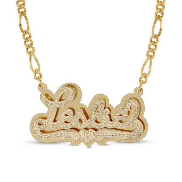 Eye-catching and bold, this personalized necklace displays your unique taste in fashion. Crafted in 14K gold over silver, this diamond-accented style showcases your name - from three to 10 characters in length - sculpted in a hammered script font. A similarly textured heart and ribbons are beautifully set beneath the name. Gleaming behind, a polished plate adds dimension to the look. Buffed to a brilliant luster, this design suspends centered along an 18.0-inch figaro chain that secures with a l Luxury Customizable Nameplate Necklace, Luxury Nameplate Necklace For Personalized Gift, Luxury Personalized Nameplate Necklace, Gold Custom Name Heart Pendant Necklace, Custom Name Gold Necklace With Heart Pendant, Custom Name Gold Plated Pendant Jewelry, Customizable Yellow Gold Necklaces For Valentine's Day, Luxury Gold Name Necklace With Custom Name, White Gold Nameplate Necklace For Personalized Gift