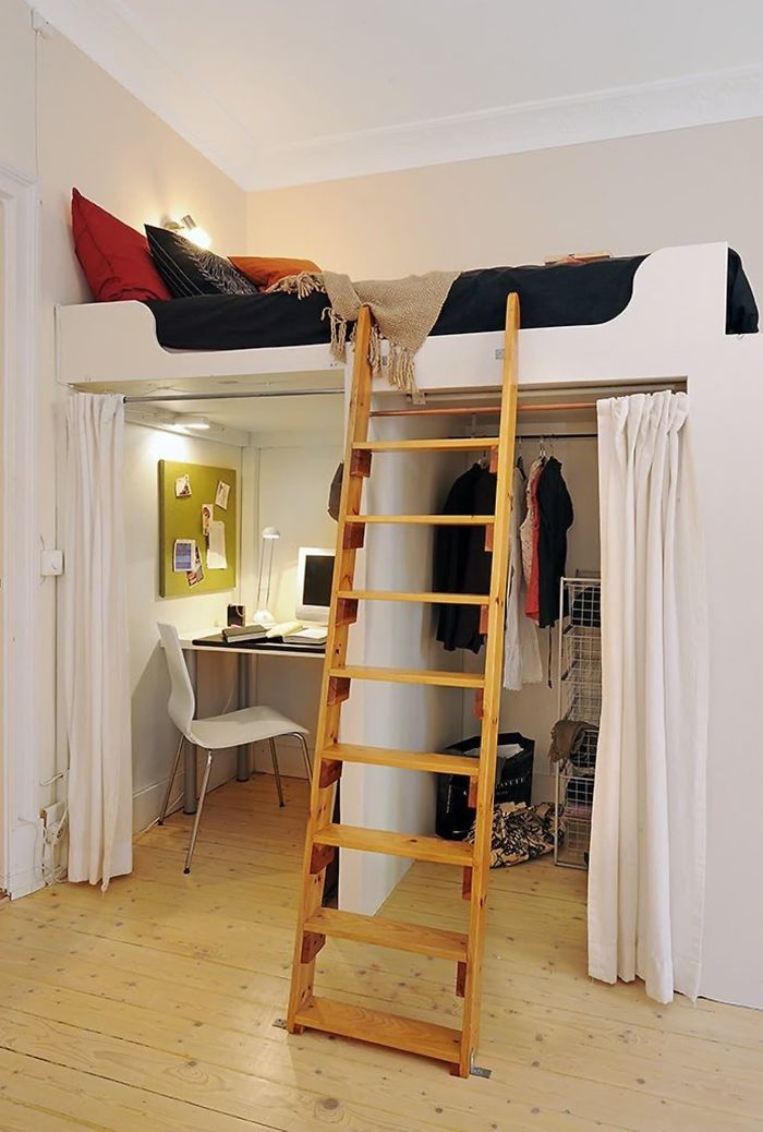 there is a ladder in the middle of this room that leads to a loft bed