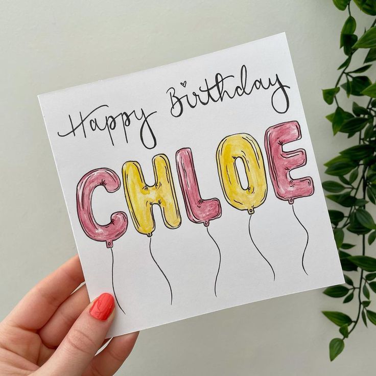 someone holding up a happy birthday card that says,'happy birthday choloe '