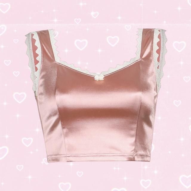 Melody inspired, satin and lace crop style. Check out our crop top range for more Y2K inspired tops <3 Size Guide Small Bust: 66 - 71 Waist: 60 - 65 Length: 24 Medium Bust: 70 - 75 Waist: 64 - 69 Length: 25 Large Bust: 74 - 79 Waist: 68 - 73 Length: 26 Kindly note the sizes many have 2-3cm variations due to manual measurement Lace Cropped Top For Night Out, Feminine Cropped Top For Night Out, Feminine Crop Top For Night Out, Trendy Fitted Crop Top With Lace Trim, Trendy Satin Crop Top, Trendy Fitted Satin Crop Top, Spring Satin Top With Lace Trim, Fitted Satin Trendy Crop Top, Lace Trim Crop Top