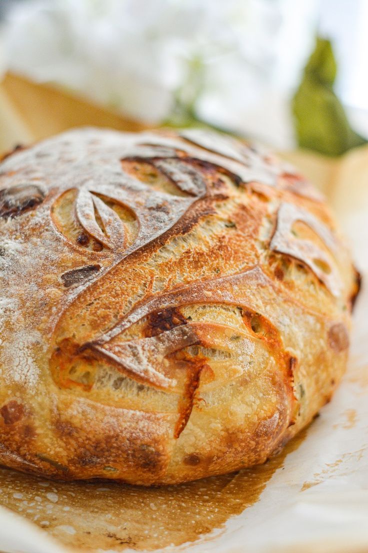 a loaf of bread sitting on top of a white plate