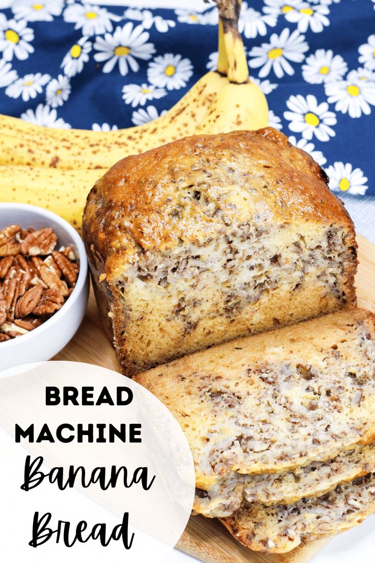 banana bread sliced and sitting on a cutting board next to a bowl of granola