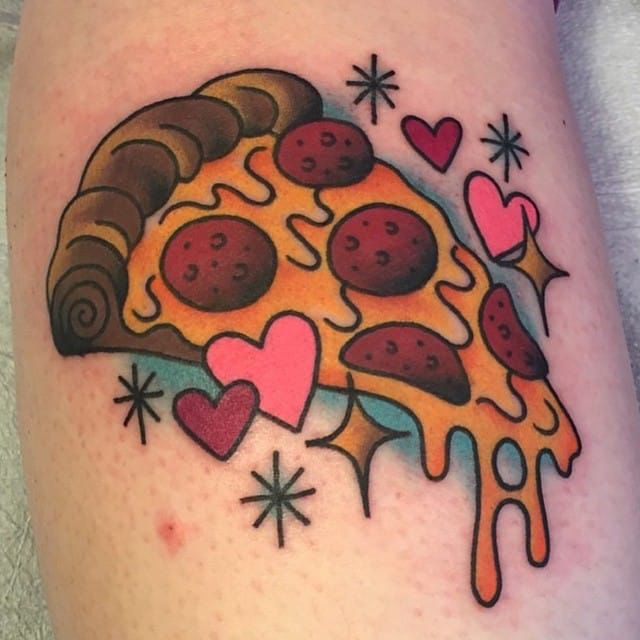 a tattoo on the leg of a person with a slice of pizza